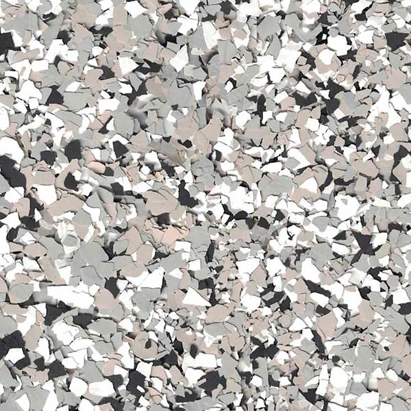 The image depicts a chaotic collection of terrazzo flooring fragments, primarily in shades of white, black, and gray, creating a speckled pattern.