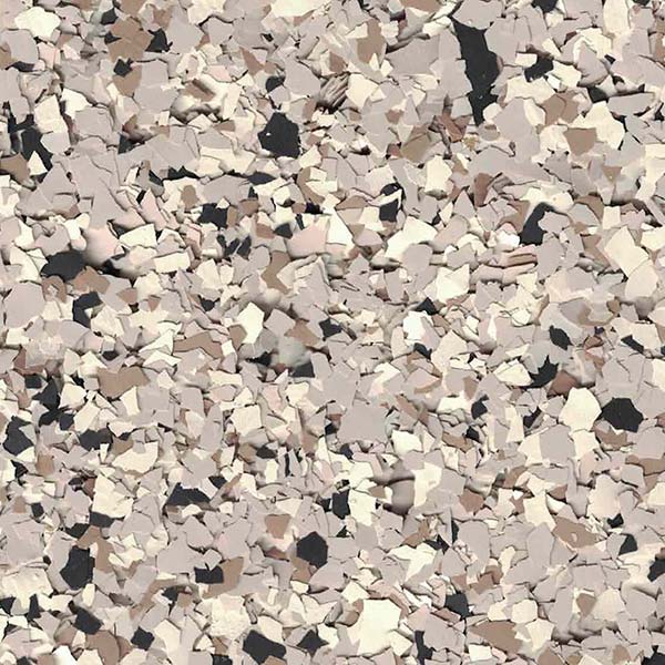 This is an image showing a multitude of irregularly shaped fragments, with varied shades of beige, brown, and black, resembling crushed stone or granules.