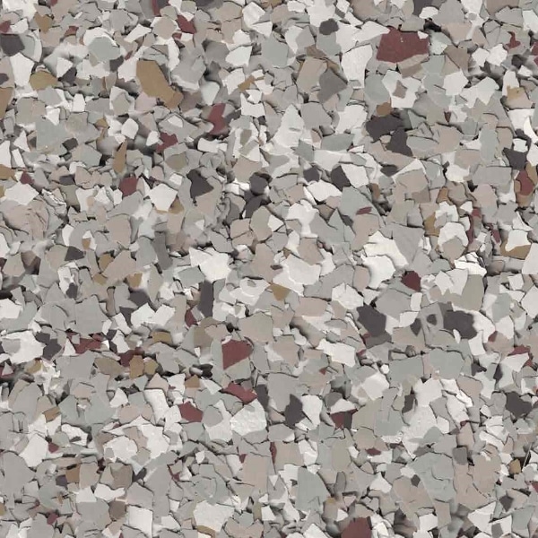 This image features a multitude of small, multicolored, irregularly shaped fragments scattered densely, resembling a textured surface or a collection of stones.