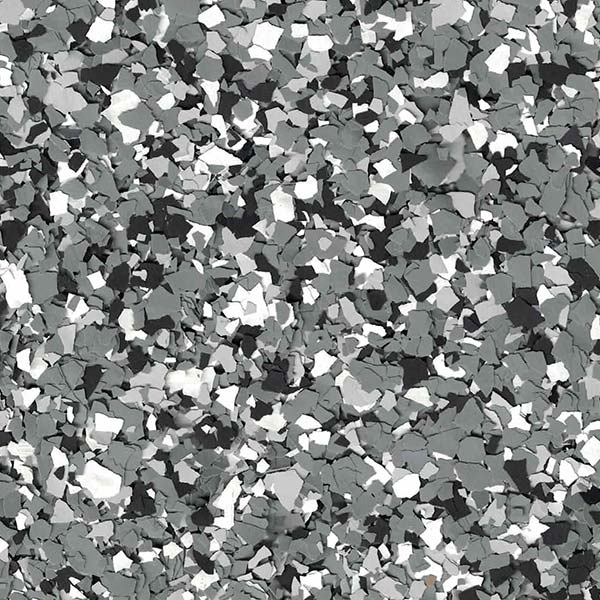 The image shows a pattern of various-sized, abstract, monochromatic shards in shades of gray, black, and white, creating a textured, mosaic-like appearance.