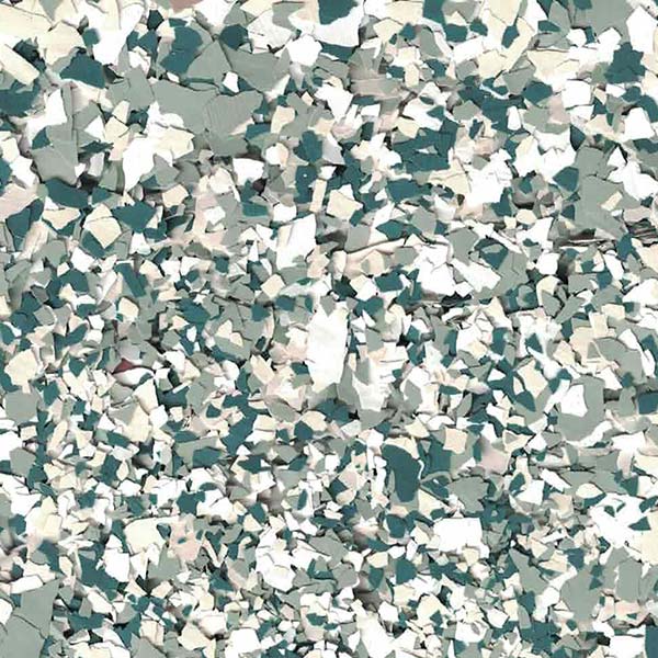 The image displays a chaotic assortment of small, sharp-edged fragments in various shades of green, white, and black, creating a textured, mosaic-like appearance.