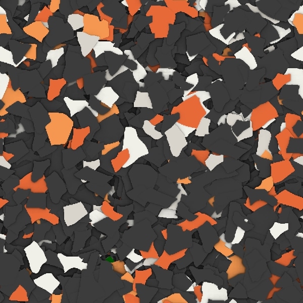 The image shows a chaotic arrangement of broken fragments in orange, black, white, and a small area of green visible. The pieces are scattered randomly.