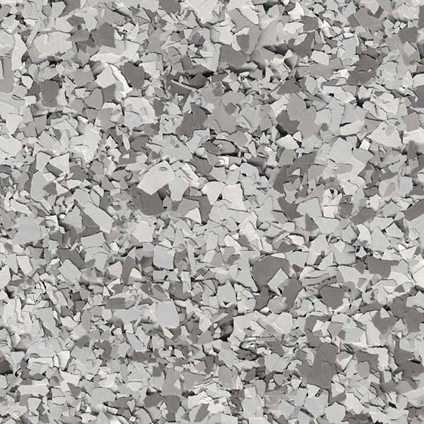 The image shows a pile of small, irregularly shaped gray rocks or broken stone fragments densely packed together, creating a textured, monochromatic surface.