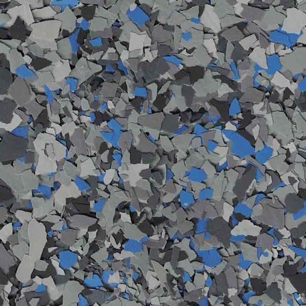 The image displays numerous shattered pieces in shades of grey and blue, creating an abstract, textured appearance with a chaotic arrangement.