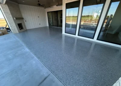 A Grey patio floor coating done professionally by Higgins Coatings
