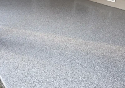 A Grey patio floor coating done professionally by Higgins Coatings
