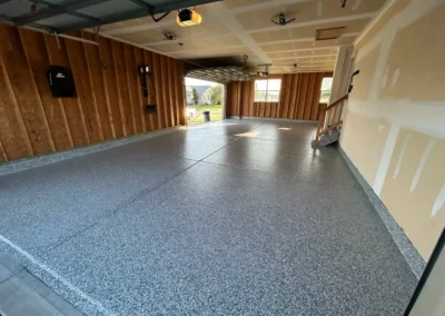 A Grey garage floor coating done professionally by Higgins Coatings