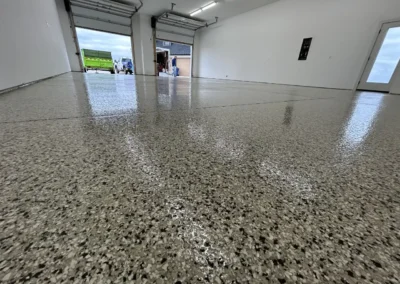 A Grey garage floor coating done professionally by Higgins Coatings